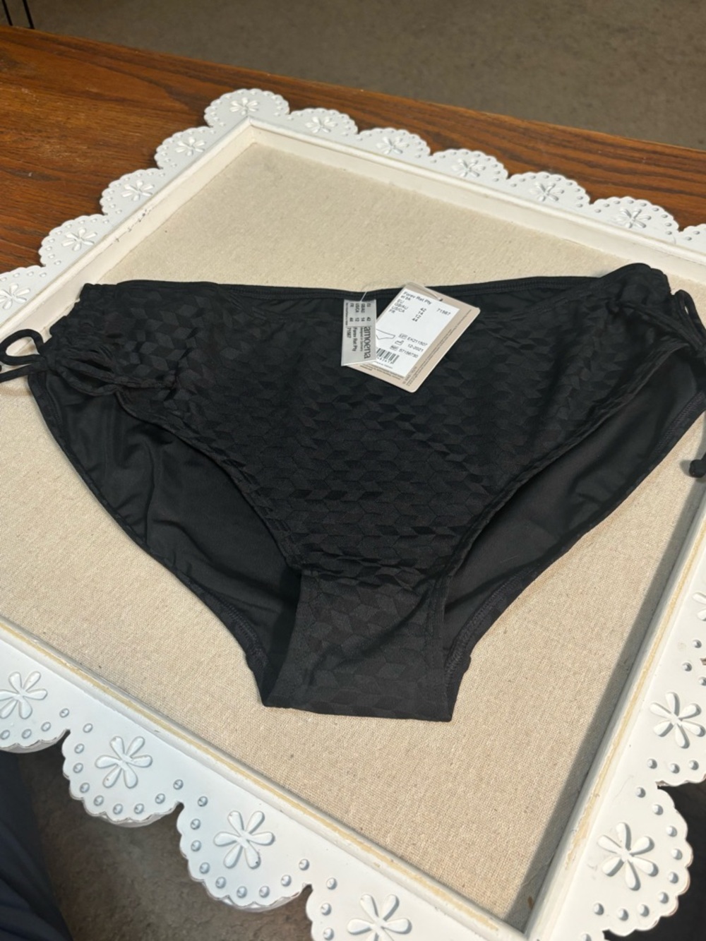 Black Bathing Suit Bottom, NWT Adjustable Side Ties. Diamond pattern.Woman’s 12